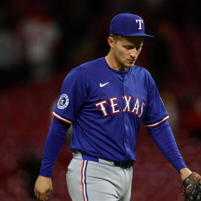 CINCINNATI, OHIO - APRIL 1: Corey Seager #5 of the Texas Rangers walks off the field after the final out in the ninth inning against the Cincinnati Reds at Great American Ball Park on April 1, 2025 in Cincinnati, Ohio. (Photo by Brandon Sloter/Getty Images)