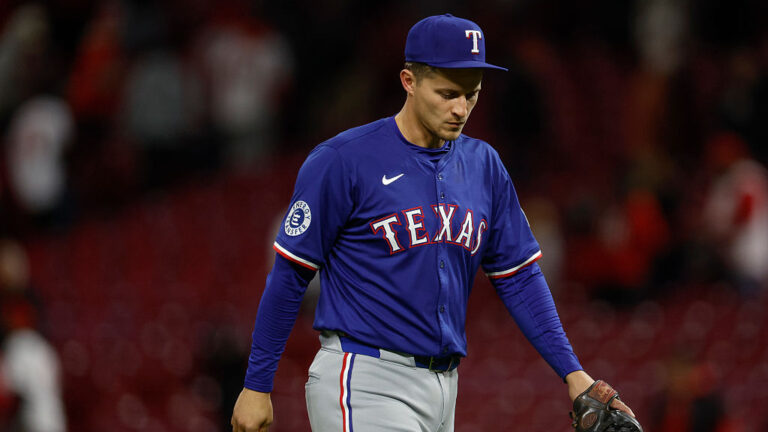 CINCINNATI, OHIO - APRIL 1: Corey Seager #5 of the Texas Rangers walks off the field after the final out in the ninth inning against the Cincinnati Reds at Great American Ball Park on April 1, 2025 in Cincinnati, Ohio. (Photo by Brandon Sloter/Getty Images)