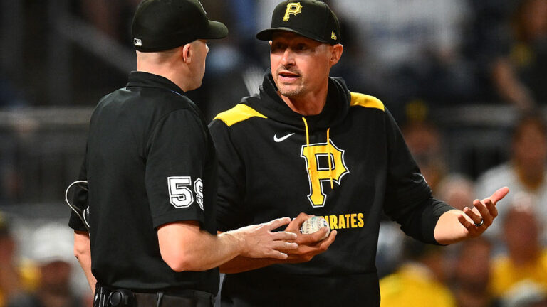 PITTSBURGH, PENNSYLVANIA - SEPTEMBER 2: Manager Don Kelly #12 of the Pittsburgh Pirates argues a call with umpire Nic Lentz #59 during the seventh inning against the Los Angeles Dodgers at PNC Park on September 2, 2025 in Pittsburgh, Pennsylvania. (Photo by Joe Sargent/Getty Images)