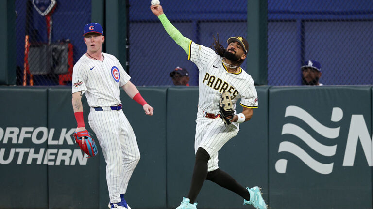 ATLANTA, GEORGIA - JULY 15: Fernando Tatis Jr. #23 of the San Diego Padres throws a ball in from center field as Pete Crow-Armstrong #4 of the Chicago Cubs looks on during the fourth inning of the MLB All-Star Game at Truist Park on July 15, 2025 in Atlanta, Georgia. (Photo by Jamie Squire/Getty Images)
