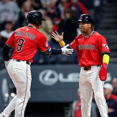CLEVELAND, OH - AUGUST 30: Cleveland Guardians first baseman Kyle Manzardo (9) is congratulated at home plate by Cleveland Guardians third baseman Jose Ramirez (11) after hitting a 2-run home run during the sixth inning of the Major League Baseball game between the Seattle Mariners and Cleveland Guardians on August 30, 2025, at Progressive Field in Cleveland, OH. (Photo by Frank Jansky/Icon Sportswire via Getty Images)