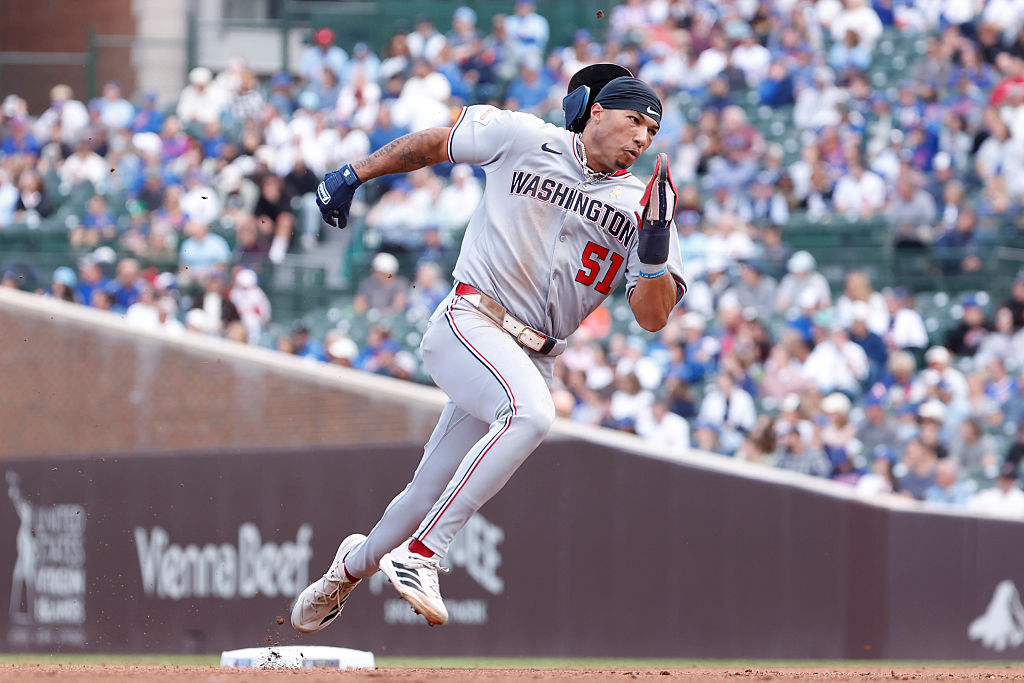 CHICAGO, ILLINOIS - SEPTEMBER 07: Daylen Lile #51 of the Washington Nationals runs towards third during the fifth inning against the Chicago Cubs at Wrigley Field on September 07, 2025 in Chicago, Illinois. (Photo by Sage Zipeto/Getty Images)
