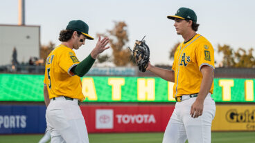 SACRAMENTO, CALIFORNIA - SEPTEMBER 12: Jacob Wilson #5 and Nick Kurtz #16 of the Athletics high five before a game against the Cincinnati Reds at Sutter Health Park on September 12, 2025 in Sacramento, California. (Photo by Justine Willard/Athletics/Getty Images)