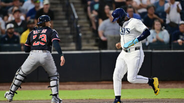 TAMPA, FLORIDA - SEPTEMBER 04: Junior Caminero #13 of the Tampa Bay Rays scores on an RBI single off the bat of Christopher Morel (not pictured) in the first inning against the Cleveland Guardians at George M. Steinbrenner Field on September 04, 2025 in Tampa, Florida. (Photo by Julio Aguilar/Getty Images)