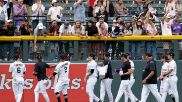 DENVER, COLORADO - SEPTEMBER 21: The Colorado Rockies circle the field after their final home game, defeationg the Los Angeles Angels at Coors Field on September 21, 2025 in Denver, Colorado. (Photo by Matthew Stockman/Getty Images)