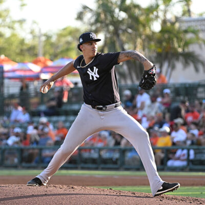 SARASOTA, FLORIDA - MARCH 15, 2025: Carlos Lagrange #30 of the New York Yankees pitches during the first inning of a Spring Breakout game against the Baltimore Orioles at Ed Smith Stadium on March 15, 2025 in Clearwater, Florida. (Photo by Diamond Images via Getty Images)