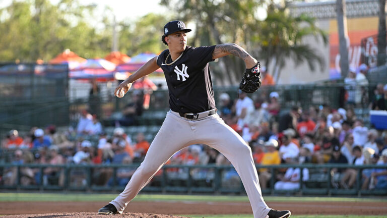 SARASOTA, FLORIDA - MARCH 15, 2025: Carlos Lagrange #30 of the New York Yankees pitches during the first inning of a Spring Breakout game against the Baltimore Orioles at Ed Smith Stadium on March 15, 2025 in Clearwater, Florida. (Photo by Diamond Images via Getty Images)