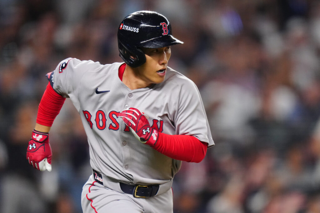 NEW YORK, NY - SEPTEMBER 30:   Masataka Yoshida #7 of the Boston Red Sox runs to first after hitting a two-run single in the seventh inning during Game One of the American League Wild Card Series between the Boston Red Sox and the New York Yankees at Yankee Stadium on Tuesday, September 30, 2025 in New York, New York. (Photo by Daniel Shirey/MLB Photos via Getty Images)