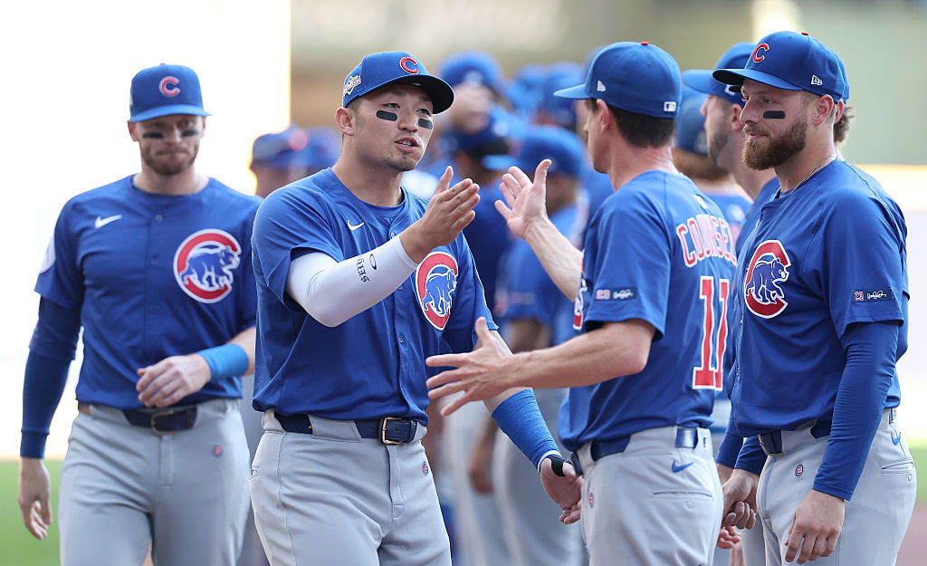 MILWAUKEE, WISCONSIN - OCTOBER 04: (L-R) Seiya Suzuki #27 of the Chicago Cubs greets manager Craig Counsell #11 prior to game one of the Division Series against the Milwaukee Brewers at American Family Field on October 04, 2025 in Milwaukee, Wisconsin. (Photo by Michael Reaves/Getty Images)
