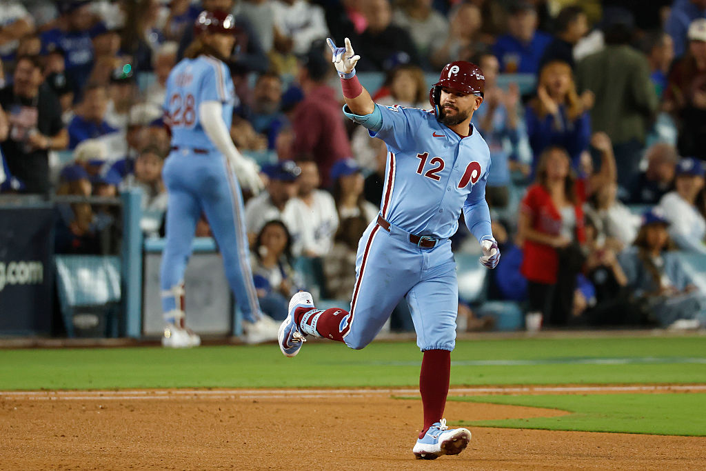 LOS ANGELES, CALIFORNIA - OCTOBER 08: Kyle Schwarber #12 of the Philadelphia Phillies reacts after hitting a solo home run against the Los Angeles Dodgers during the fourth inning in game three of the National League Division Series at Dodger Stadium on October 08, 2025 in Los Angeles, California. (Photo by Harry How/Getty Images)