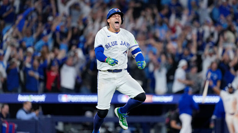TORONTO, ONTARIO - OCTOBER 20: George Springer #4 of the Toronto Blue Jays celebrates after hitting a three-run home run against the Seattle Mariners during the seventh inning in game seven of the American League Championship Series at the Rogers Centre on October 20, 2025 in Toronto, Ontario. (Photo by Mark Blinch/Getty Images)