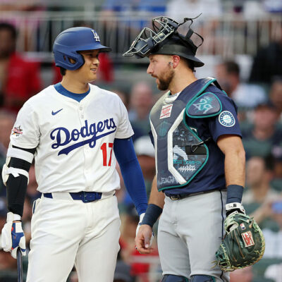 ATLANTA, GEORGIA - JULY 15: Shohei Ohtani #17 of the Los Angeles Dodgers and Cal Raleigh #29 of the Seattle Mariners speak during the first inning of the MLB All-Star Game at Truist Park on July 15, 2025 in Atlanta, Georgia. (Photo by Kevin C. Cox/Getty Images)
