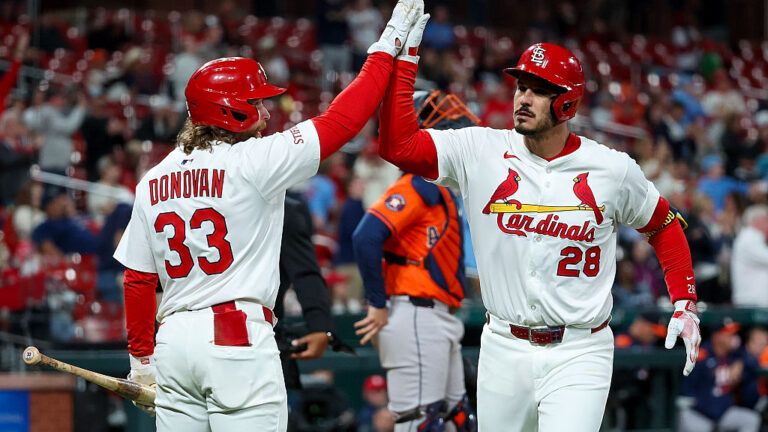 ST LOUIS, MISSOURI - APRIL 14: Brendan Donovan #33 congratulates Nolan Arenado #28 of the St. Louis Cardinals after Arenado hit a solo home run during the seventh inning against the Houston Astros at Busch Stadium on April 14, 2025 in St Louis, Missouri. (Photo by Scott Kane/Getty Images)