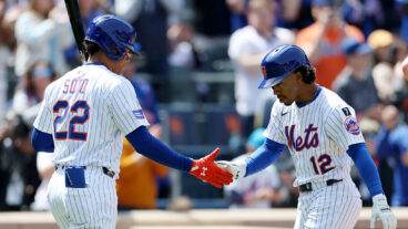 NEW YORK, NEW YORK - APRIL 20: Francisco Lindor #12 of the New York Mets is congratulated by on deck teammate Juan Soto #22 after Lindor hit a solo home run in the first inning against the St. Louis Cardinals at Citi Field on April 20, 2025 in the Flushing neighborhood of the Queens borough of New York City. (Photo by Elsa/Getty Images)