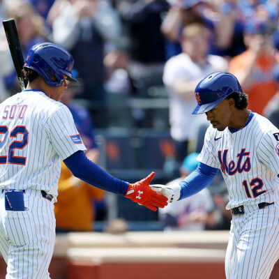 NEW YORK, NEW YORK - APRIL 20: Francisco Lindor #12 of the New York Mets is congratulated by on deck teammate Juan Soto #22 after Lindor hit a solo home run in the first inning against the St. Louis Cardinals at Citi Field on April 20, 2025 in the Flushing neighborhood of the Queens borough of New York City. (Photo by Elsa/Getty Images)