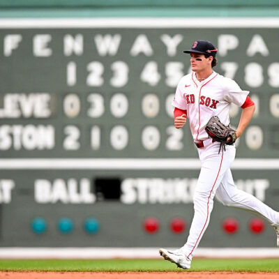 BOSTON, MASSACHUSETTS - SEPTEMBER 01: Roman Anthony #19 of the Boston Red Sox runs off of the field after a game against the Cleveland Guardians at Fenway Park on September 01, 2025 in Boston, Massachusetts. (Photo by Brian Fluharty/Getty Images)