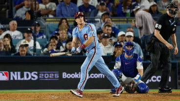 LOS ANGELES, CALIFORNIA - OCTOBER 08: J.T. Realmuto #10 of the Philadelphia Phillies reacts after hitting a solo home run against the Los Angeles Dodgers during the eighth inning in game three of the National League Division Series at Dodger Stadium on October 08, 2025 in Los Angeles, California. (Photo by Harry How/Getty Images)