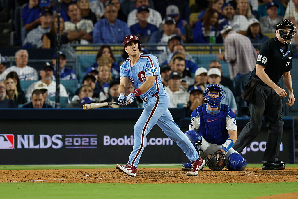 LOS ANGELES, CALIFORNIA - OCTOBER 08: J.T. Realmuto #10 of the Philadelphia Phillies reacts after hitting a solo home run against the Los Angeles Dodgers during the eighth inning in game three of the National League Division Series at Dodger Stadium on October 08, 2025 in Los Angeles, California. (Photo by Harry How/Getty Images)