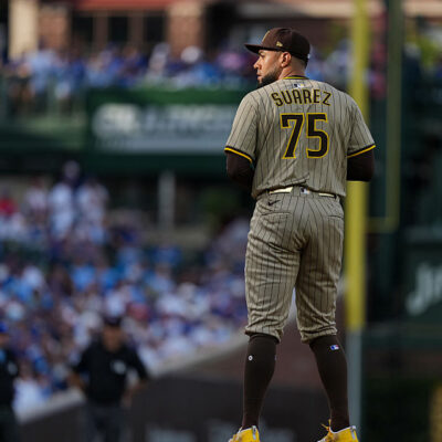 CHICAGO, IL - OCTOBER 01: Robert Suarez #75 of the San Diego Padres looks on during Game Two of the National League Wild Card Series between the San Diego Padres and the Chicago Cubs at Wrigley Field on Wednesday, October 1, 2025 in Chicago, Illinois. (Photo by Mary DeCicco/MLB Photos via Getty Images)