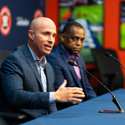 HOUSTON, TEXAS - SEPTEMBER 30: Manager Joe Espada of the Houston Astros speaks with General Manager Dana Brown during an end of season press conference at Daikin Park on September 30, 2025 in Houston, Texas. (Photo by Houston Astros/Getty Images)