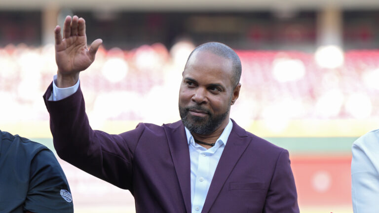 CINCINNATI, OHIO - MAY 14: Former player Barry Larkin gestures as George Foster and Eric Davis look on during a memorial ceremony for former player Pete Rose on Pete Rose Night prior to a baseball game between the Chicago White Sox and Cincinnati Reds at Great American Ball Park on May 14, 2025 in Cincinnati, Ohio. (Photo by Jeff Dean/Getty Images)
