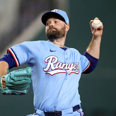 ARLINGTON, TEXAS - AUGUST 24: Danny Coulombe #54 of the Texas Rangers throws a pitch during the eighth inning against the Cleveland Guardians at Globe Life Field on August 24, 2025 in Arlington, Texas. (Photo by Tim Heitman/Getty Images)