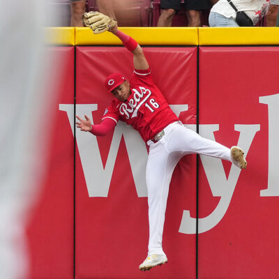 CINCINNATI, OHIO - SEPTEMBER 25: Noelvi Marte #16 of the Cincinnati Reds leaps to make a catch in the ninth inning against the Pittsburgh Pirates at Great American Ball Park on September 25, 2025 in Cincinnati, Ohio. (Photo by Dylan Buell/Getty Images)