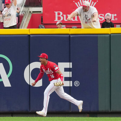 CINCINNATI, OHIO - SEPTEMBER 25: Noelvi Marte #16 of the Cincinnati Reds celebrates after making a catch in the ninth inning against the Pittsburgh Pirates at Great American Ball Park on September 25, 2025 in Cincinnati, Ohio. (Photo by Dylan Buell/Getty Images)