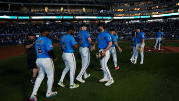 MIAMI, FLORIDA - SEPTEMBER 28: Xavier Edwards #9 of the Miami Marlins, Otto Lopez #6 of the Miami Marlins, Graham Pauley #21 of the Miami Marlins and Joey Wiemer #41 of the Miami Marlins celebrate after defeating the the New York Mets at loanDepot park on September 28, 2025 in Miami, Florida. (Photo by Jasen Vinlove/Miami Marlins/Getty Images)