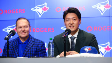 TORONTO, CANADA - JANUARY 6: Kazuma Okamoto #7 of the Toronto Blue Jays is introduced during a press conference alongside his agent Scott Boras at Rogers Centre on January 6, 2026 in Toronto, Canada. (Photo by Cole Burston/Getty Images)