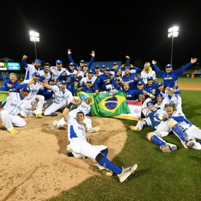 TUCSON, AZ - MARCH 06: Members of Team Brazil pose for a photo to celebrate a win after the game between the Team Germany and the Team Brazil at Veterans Memorial Stadium at Kino Sports Complex on Thursday, March 6, 2025 in Tucson, Arizona. (Photo by Norm Hall/MLB Photos via Getty Images)