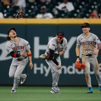 ATLANTA, GEORGIA - JUNE 3: (L-R) Alek Thomas #5, Tim Tawa #13, and Corbin Carroll #7 of the Arizona Diamondbacks celebrate after a team victory over the Atlanta Braves at Truist Park on June 3, 2025 in Atlanta, Georgia. (Photo by Brandon Sloter/Getty Images)