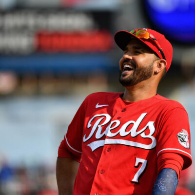 CINCINNATI, OH - JULY 3: Eugenio Suárez #7 of the Cincinnati Reds is amused by a fan during a game against the Chicago Cubs at Great American Ball Park on July 3, 2021 in Cincinnati, Ohio. (Photo by Jamie Sabau/Getty Images)