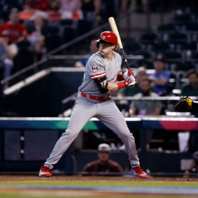 PHOENIX, ARIZONA - MARCH 14: Owen Caissie #21 of Team Canada bats against Team Colombia during the World Baseball Classic Pool C game at Chase Field on March 14, 2023 in Phoenix, Arizona. Canada beat Colombia 5-0. (Photo by Chris Coduto/Getty Images)