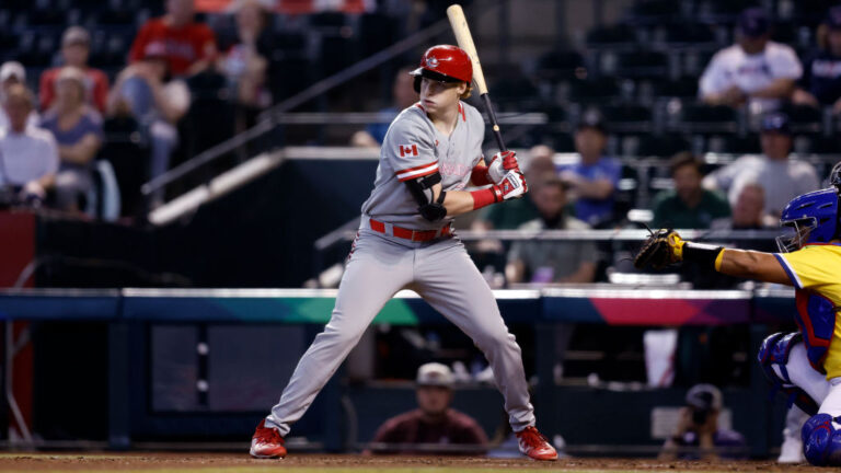 PHOENIX, ARIZONA - MARCH 14: Owen Caissie #21 of Team Canada bats against Team Colombia during the World Baseball Classic Pool C game at Chase Field on March 14, 2023 in Phoenix, Arizona. Canada beat Colombia 5-0. (Photo by Chris Coduto/Getty Images)