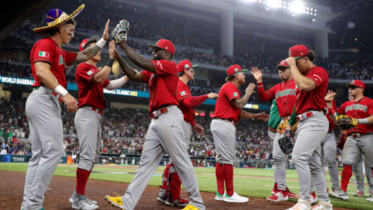 MIAMI, FLORIDA - MARCH 20: Randy Arozarena #56 of Team Mexico high fives teammates after the fifth inning a during the World Baseball Classic Semifinals at loanDepot park on March 20, 2023 in Miami, Florida. (Photo by Megan Briggs/Getty Images)