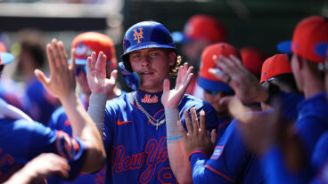 JUPITER, FLORIDA - FEBRUARY 27: Carson Benge #93 of the New York Mets celebrates after scoring against the St. Louis Cardinals during the first inning of a spring training gameat Roger Dean Stadium on February 27, 2026 in Jupiter, Florida. (Photo by Rich Storry/Getty Images)