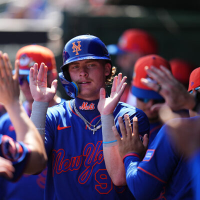 JUPITER, FLORIDA - FEBRUARY 27: Carson Benge #93 of the New York Mets celebrates after scoring against the St. Louis Cardinals during the first inning of a spring training gameat Roger Dean Stadium on February 27, 2026 in Jupiter, Florida. (Photo by Rich Storry/Getty Images)