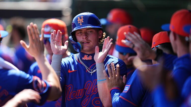 JUPITER, FLORIDA - FEBRUARY 27: Carson Benge #93 of the New York Mets celebrates after scoring against the St. Louis Cardinals during the first inning of a spring training gameat Roger Dean Stadium on February 27, 2026 in Jupiter, Florida. (Photo by Rich Storry/Getty Images)