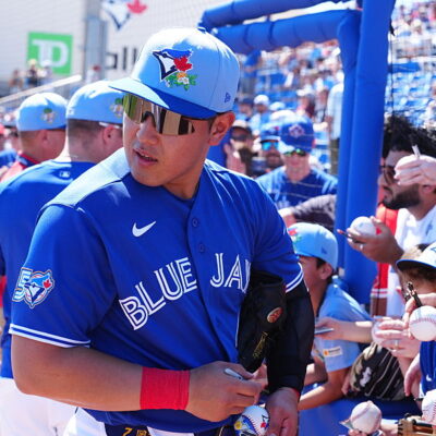 DUNEDIN, FL - FEBRUARY 21: Toronto Blue Jays third baseman Kazuma Okamoto (7) signs autographs before the game against the Philadelphia Phillies on February 21, 2026, at TD Ballpark in Dunedin, Florida. (Photo by Brian Spurlock/Icon Sportswire via Getty Images)