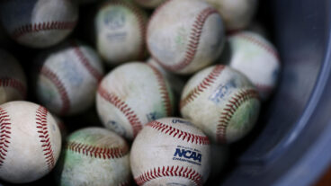 HOUSTON, TEXAS - MARCH 01: A detail of the NCAA logo on a baseball prior to the game between the Oklahoma State Cowboys and the Texas A&M Aggies in the Astros Foundation College Classic at Daikin Park on March 01, 2025, in Houston, Texas. (Photo by Aaron M. Sprecher/Getty Images)