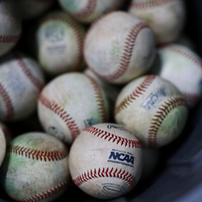 HOUSTON, TEXAS - MARCH 01: A detail of the NCAA logo on a baseball prior to the game between the Oklahoma State Cowboys and the Texas A&M Aggies in the Astros Foundation College Classic at Daikin Park on March 01, 2025, in Houston, Texas. (Photo by Aaron M. Sprecher/Getty Images)