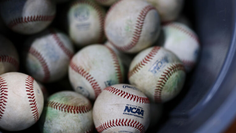 HOUSTON, TEXAS - MARCH 01: A detail of the NCAA logo on a baseball prior to the game between the Oklahoma State Cowboys and the Texas A&M Aggies in the Astros Foundation College Classic at Daikin Park on March 01, 2025, in Houston, Texas. (Photo by Aaron M. Sprecher/Getty Images)