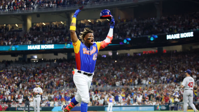 MIAMI, FL - MARCH 18: Ronald Acuña Jr. #42 of Team Venezuela reacts after hitting a sacrifice fly to score Luis Arraez #2 in the fifth inning during the 2023 World Baseball Classic Quarterfinal game between Team USA and Team Venezuela at loanDepot Park on Saturday, March 18, 2023 in Miami, Florida. (Photo by Rob Tringali/WBCI/MLB Photos via Getty Images)