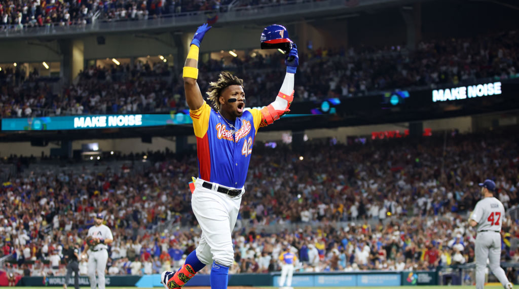 MIAMI, FL - MARCH 18:  Ronald Acuña Jr. #42 of Team Venezuela reacts after hitting a sacrifice fly to score Luis Arraez #2 in the fifth inning during the 2023 World Baseball Classic Quarterfinal game between Team USA and Team Venezuela at loanDepot Park on Saturday, March 18, 2023 in Miami, Florida. (Photo by Rob Tringali/WBCI/MLB Photos via Getty Images)
