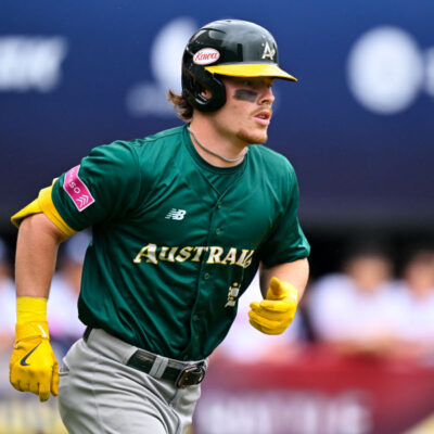 TAIPEI, TAIWAN - NOVEMBER 18: Travis Bazzana #4 of Team Australia reacts after hitting in the top of the first inning during the WBSC Premier12 Opening Round Group B game between Australia and South Korea at Taipei Tianmu Baseball Stadium on November 18, 2024 in Taipei, Taiwan. (Photo by Gene Wang/Getty Images)