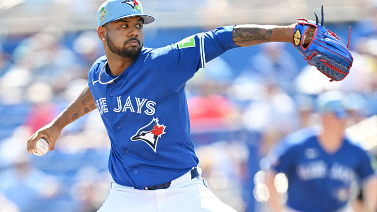 DUNEDIN, FLORIDA - MARCH 03: Angel Bastardo #99 of the Toronto Blue Jays delivers a pitch in the third inning against team Canada during a game at TD Ballpark on March 03, 2026 in Dunedin, Florida. (Photo by Julio Aguilar/Getty Images)
