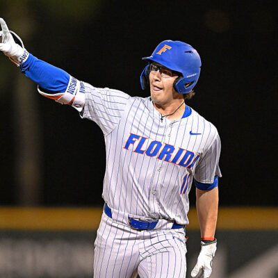 CORAL GABLES, FL - FEBRUARY 27: Florida infielder Brendan Lawson (11) signals to fans in left field while rounding the bases after hitting a solo home run in the first inning as the Miami Hurricanes faced the Florida Gators on February 27, 2026, at Mark Light Field at Alex Rodriguez Park in Coral Gables, Florida. (Photo by Samuel Lewis/Icon Sportswire via Getty Images)