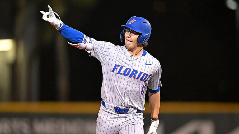 CORAL GABLES, FL - FEBRUARY 27: Florida infielder Brendan Lawson (11) signals to fans in left field while rounding the bases after hitting a solo home run in the first inning as the Miami Hurricanes faced the Florida Gators on February 27, 2026, at Mark Light Field at Alex Rodriguez Park in Coral Gables, Florida. (Photo by Samuel Lewis/Icon Sportswire via Getty Images)