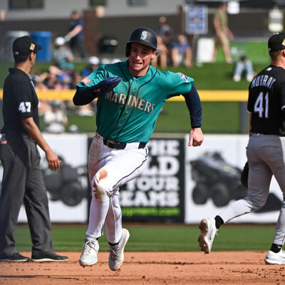 PEORIA, ARIZONA - FEBRUARY 24, 2026: Colt Emerson #85 of the Seattle Mariners runs to third base to score on a two-run double hit by Julio Rodríguez during the fourth inning of a spring training game against the Chicago White Sox at Peoria Stadium on February 24, 2026 in Peoria, Arizona. (Photo by David Durochik/Diamond Images via Getty Images)